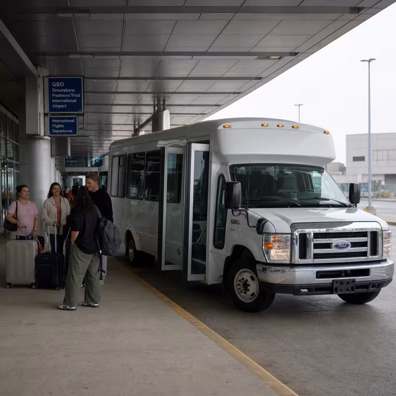 Black Mercedes Sprinter van staged for an Greensboro Airport Transportation group