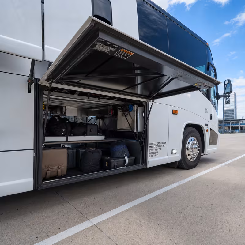 Party bus interior with wraparound leather seating and LED lighting in Greensboro