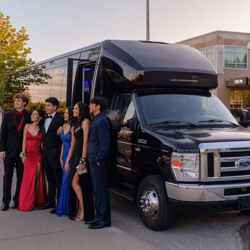 Group boarding a white charter bus for Prom & Homecoming Transportation transportation in Greensboro